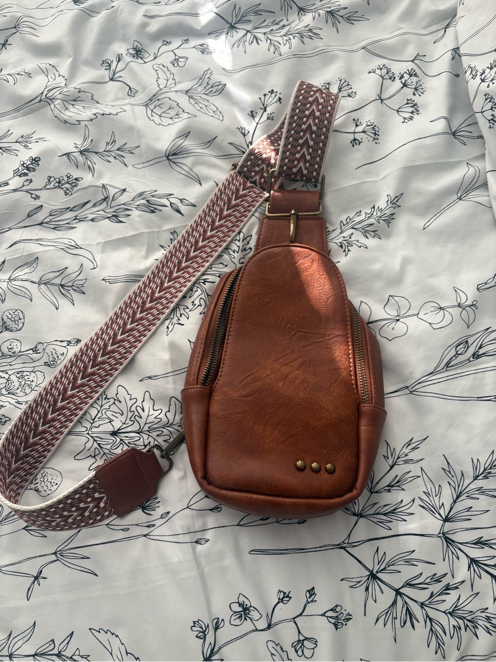 Tan Leather Crossbody Sling Bag with Patterned Strap